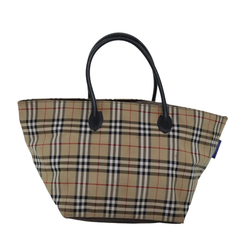 Monogrammed Tote Bag in Brown Leather with Personalized Initials for a Custom and Elegant TouchLinen Tote Bag in Natural Beige with Braided Details for a Rustic Summer EnsembleBurberry blue Label  Canvas Tote Bag (Pre-Owned)