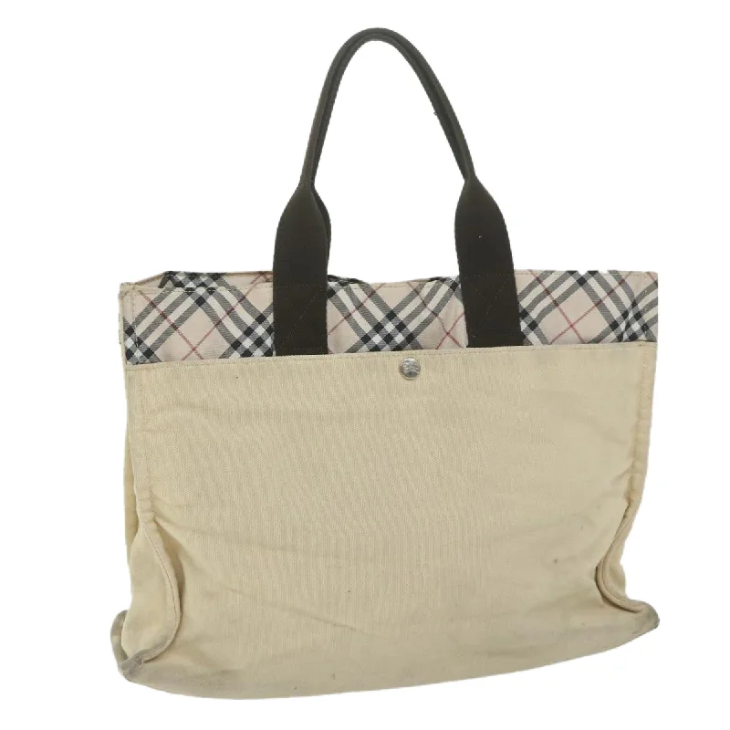 Embroidered Tote Bag in Beige with Floral Motifs for a Boho - Chic VibeMetallic Tote Bag in Rose Gold with Chain Handles for a Glamorous Night OutBurberry blue Label Canvas Tote Bag (Pre-Owned) Embroidered Tote Bag in Beige with Floral Motifs for a Boho - Chic VibeMetallic Tote Bag in Rose Gold with Chain Handles for a Glamorous Night OutBurberry blue Label Canvas Tote Bag (Pre-Owned)