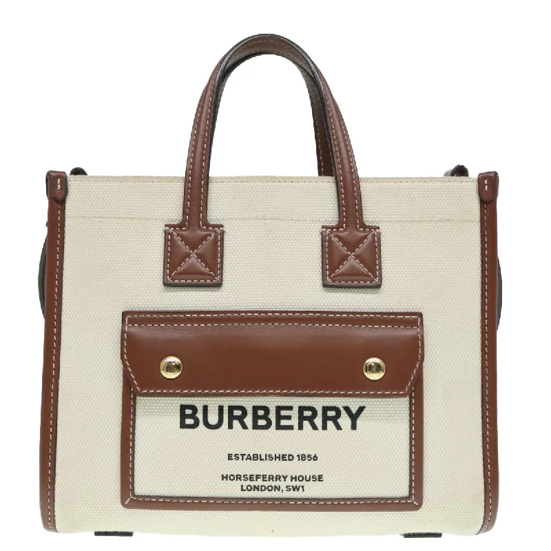 Medium - Sized Canvas Tote Bag in Navy Blue with Striped Pattern for a Nautical - Inspired LookFaux Fur - Trimmed Tote Bag in White for a Cozy Winter LookBurberry Freya  Canvas Tote Bag (Pre-Owned)