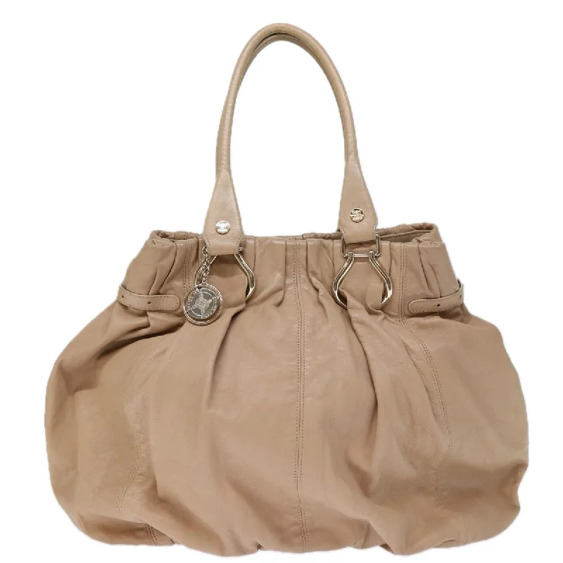 Linen Tote Bag in Natural Beige with Braided Details for a Rustic Summer EnsembleOversized Jute Tote Bag in Natural Color with Rope Handles for a Beach VacationCéline  Leather Tote Bag (Pre-Owned)