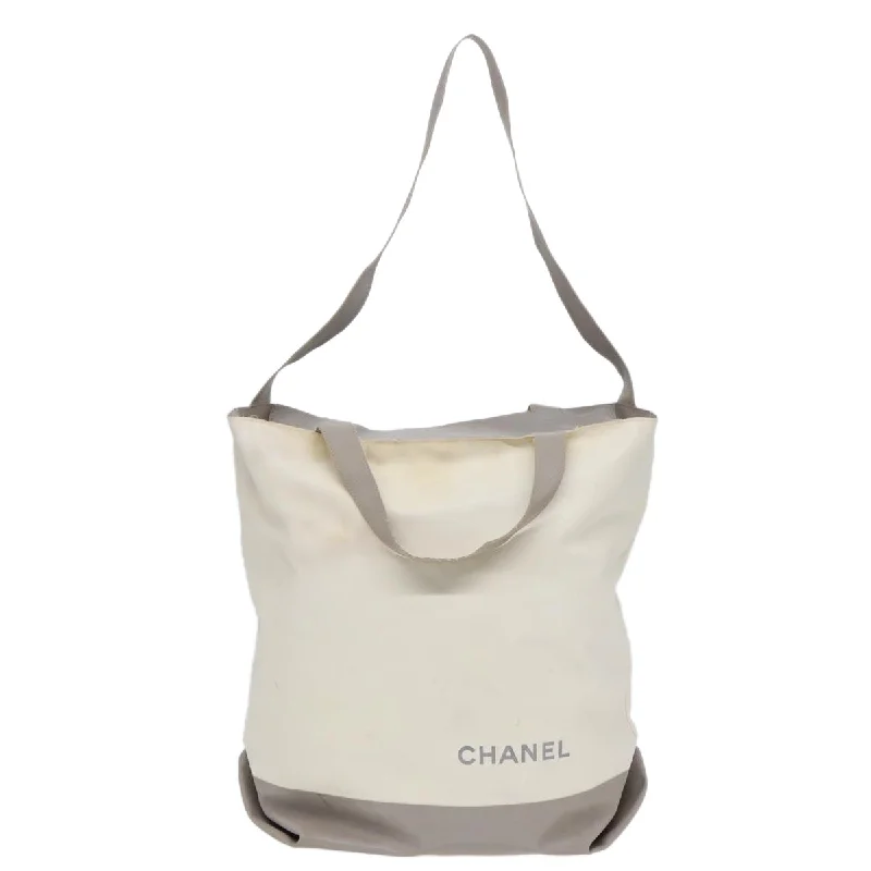 Small Vegan Leather Tote Bag in Blush Pink with Gold - Tone Hardware for a Feminine and Stylish AccessoryEmbroidered Tote Bag in Beige with Floral Motifs for a Boho - Chic VibeChanel Cabas  Canvas Tote Bag (Pre-Owned)