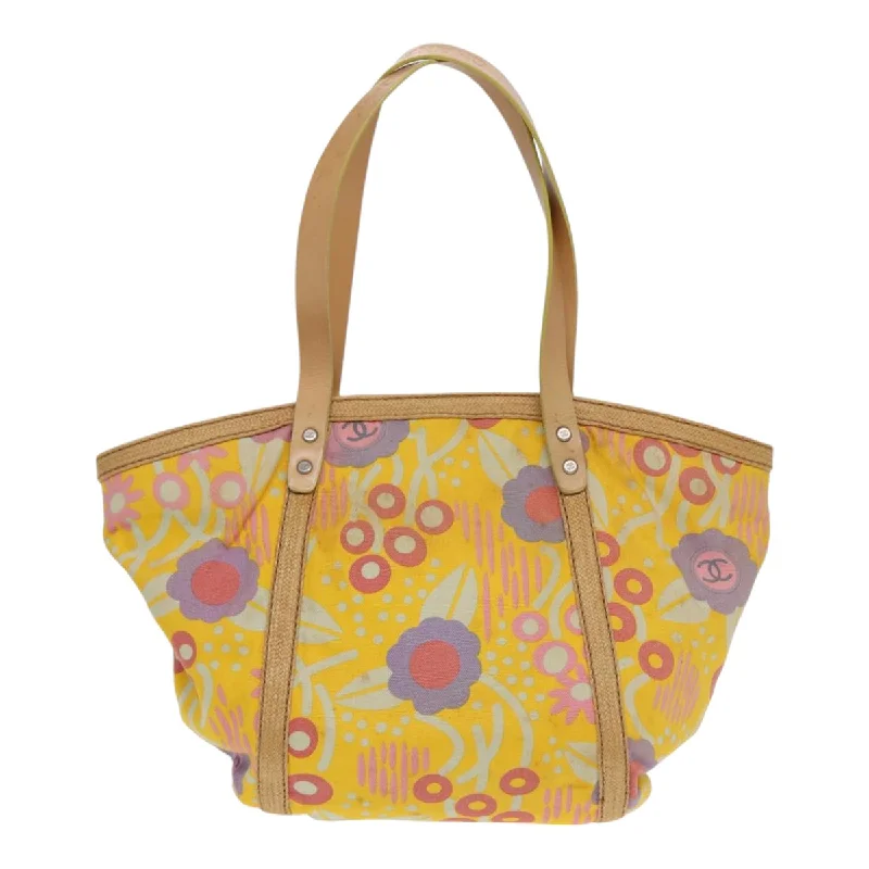 Quilted Tote Bag in Cream with Silver Hardware for a Classic and Sophisticated StyleGeometric - Printed Tote Bag in Multicolor for a Contemporary and Trendy OutfitChanel Camellia  Canvas Tote Bag (Pre-Owned)
