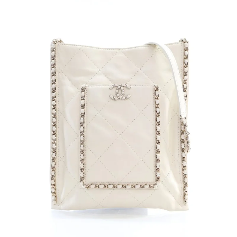 Metallic Tote Bag in Rose Gold with Chain Handles for a Glamorous Night OutChanel Quilted Shopping Tote Small White Calfskin