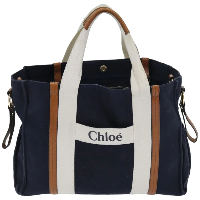 Patchwork Tote Bag in Denim with Vintage - Inspired Designs for a Retro AppealWomen's Tote Bag with Magnetic Closure in Orange for Easy Access on the GoChloé Woody  Canvas Tote Bag (Pre-Owned)