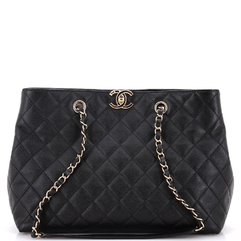 Quilted Tote Bag in Cream with Silver Hardware for a Classic and Sophisticated StyleClassic CC Shopping Tote Quilted Caviar Medium Quilted Tote Bag in Cream with Silver Hardware for a Classic and Sophisticated StyleClassic CC Shopping Tote Quilted Caviar Medium