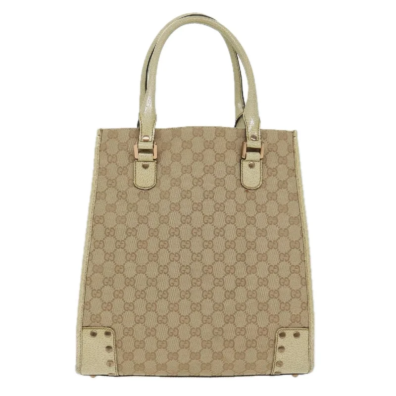 Metallic Tote Bag in Rose Gold with Chain Handles for a Glamorous Night OutFaux Fur - Trimmed Tote Bag in White for a Cozy Winter LookGucci  Canvas Tote Bag (Pre-Owned)