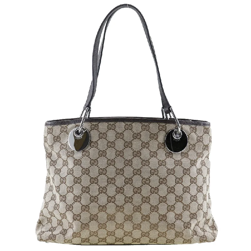 Medium - Sized Canvas Tote Bag in Navy Blue with Striped Pattern for a Nautical - Inspired LookMedium - Sized Canvas Tote Bag in Navy Blue with Striped Pattern for a Nautical - Inspired LookGucci Gg Canvas  Canvas Tote Bag (Pre-Owned)