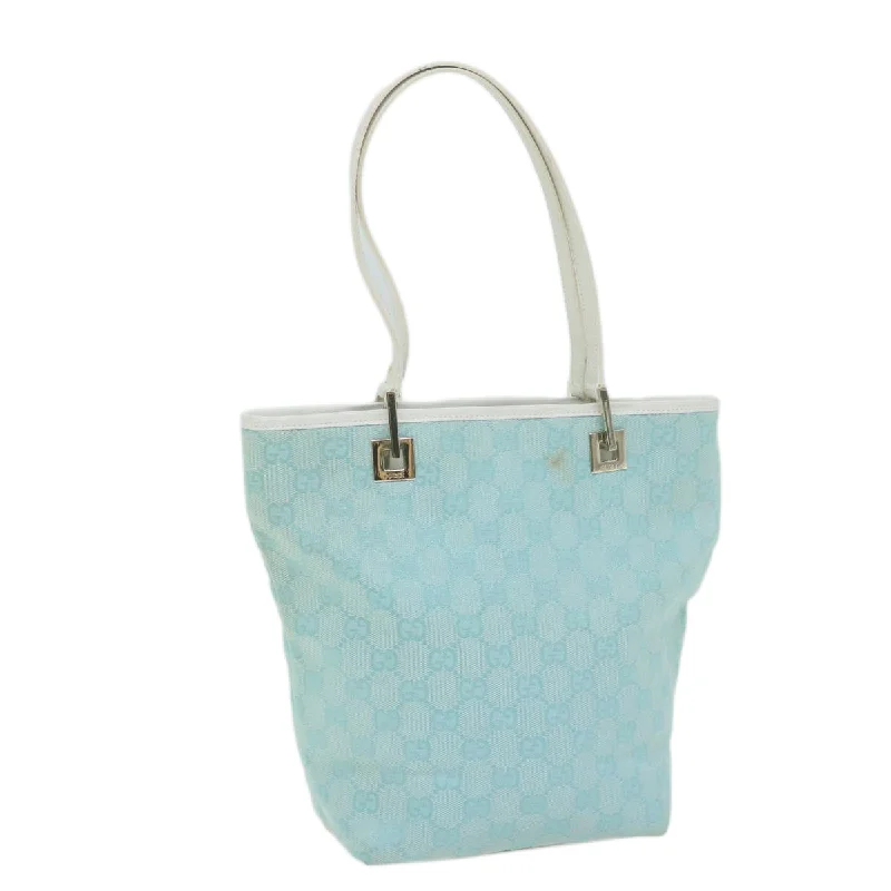 Linen Tote Bag in Natural Beige with Braided Details for a Rustic Summer EnsembleWaterproof Tote Bag in Yellow for Outdoor Activities in Wet WeatherGucci Gg Canvas  Canvas Tote Bag (Pre-Owned)