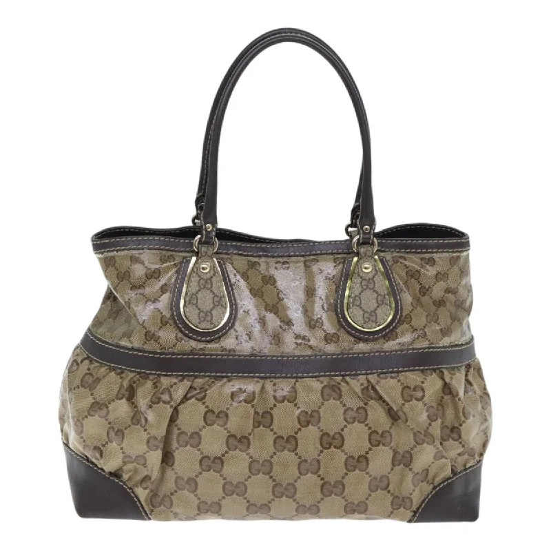 Linen Tote Bag in Natural Beige with Braided Details for a Rustic Summer EnsembleMedium - Sized Canvas Tote Bag in Navy Blue with Striped Pattern for a Nautical - Inspired LookGucci Gg Crystal  Canvas Tote Bag (Pre-Owned)