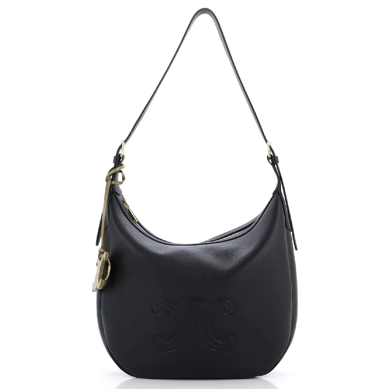 Pvc Shoulder Bag in Clear with Glitter for a Fun and Modern LookHeloise Shoulder Bag Triomphe Embossed Leather Pvc Shoulder Bag in Clear with Glitter for a Fun and Modern LookHeloise Shoulder Bag Triomphe Embossed Leather
