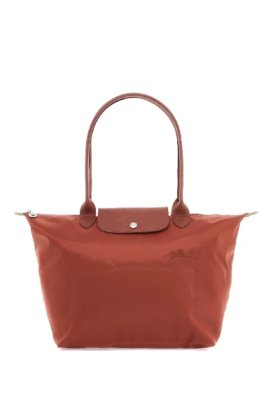 Small Vegan Leather Tote Bag in Blush Pink with Gold - Tone Hardware for a Feminine and Stylish AccessoryMetallic Tote Bag in Rose Gold with Chain Handles for a Glamorous Night OutLongchamp Le Pliage Green L Tote Bag Small Vegan Leather Tote Bag in Blush Pink with Gold - Tone Hardware for a Feminine and Stylish AccessoryMetallic Tote Bag in Rose Gold with Chain Handles for a Glamorous Night OutLongchamp Le Pliage Green L Tote Bag