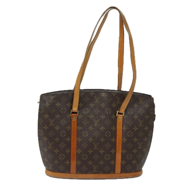 Patchwork Tote Bag in Denim with Vintage - Inspired Designs for a Retro AppealPatchwork Tote Bag in Denim with Vintage - Inspired Designs for a Retro AppealLouis Vuitton Babylone  Canvas Tote Bag (Pre-Owned)