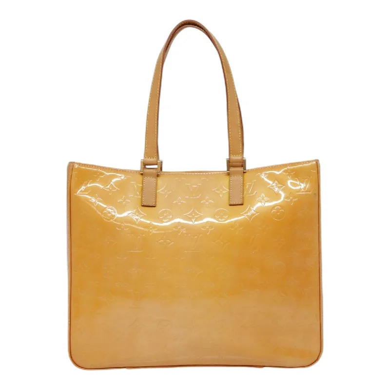 Metallic Tote Bag in Rose Gold with Chain Handles for a Glamorous Night OutFaux Fur - Trimmed Tote Bag in White for a Cozy Winter LookLouis Vuitton Columbus  Patent Leather Tote Bag (Pre-Owned)