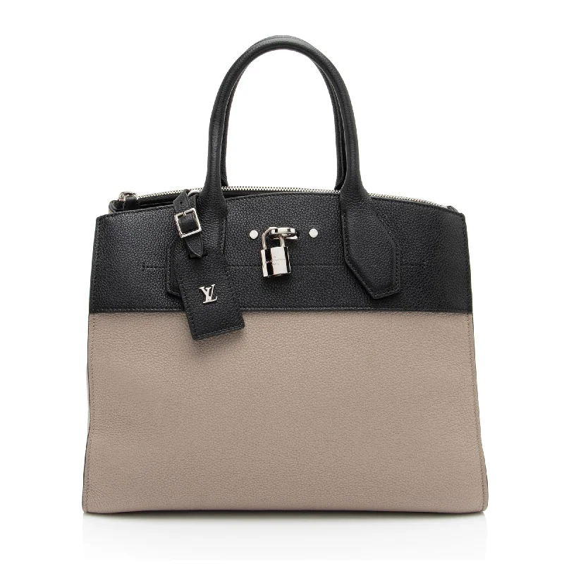 Large Capacity Genuine Leather Women's Tote Bag in Black for Work and CommutingWaterproof Tote Bag in Yellow for Outdoor Activities in Wet WeatherLouis Vuitton Taurillon City Steamer MM Tote
