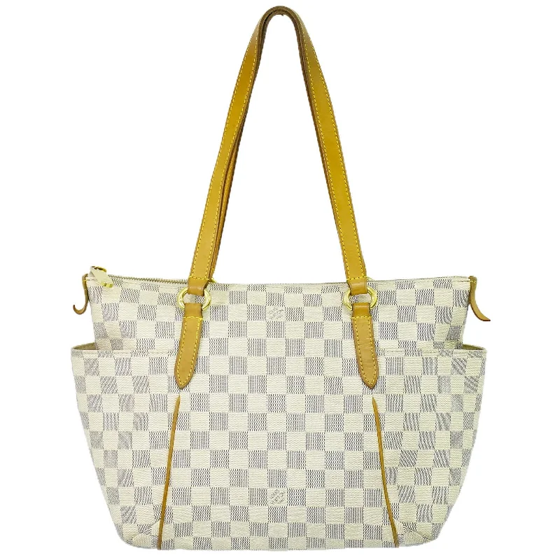 Large Capacity Genuine Leather Women's Tote Bag in Black for Work and CommutingGeometric - Printed Tote Bag in Multicolor for a Contemporary and Trendy OutfitLouis Vuitton Totally  Canvas Tote Bag (Pre-Owned)