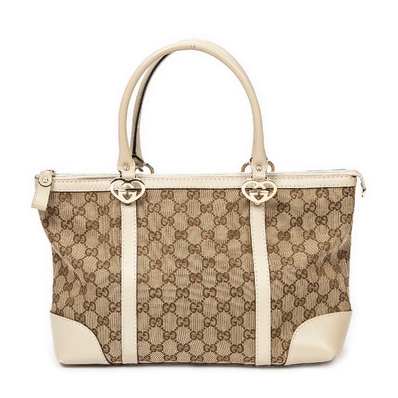 Monogrammed Tote Bag in Brown Leather with Personalized Initials for a Custom and Elegant TouchLinen Tote Bag in Natural Beige with Braided Details for a Rustic Summer EnsembleLovely Tote Monogrammed Tote Bag in Brown Leather with Personalized Initials for a Custom and Elegant TouchLinen Tote Bag in Natural Beige with Braided Details for a Rustic Summer EnsembleLovely Tote