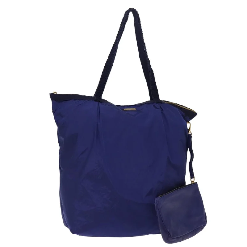 Women's Tote Bag with Magnetic Closure in Orange for Easy Access on the GoPatchwork Tote Bag in Denim with Vintage - Inspired Designs for a Retro AppealMiu Miu -- Synthetic Tote Bag (Pre-Owned) Women's Tote Bag with Magnetic Closure in Orange for Easy Access on the GoPatchwork Tote Bag in Denim with Vintage - Inspired Designs for a Retro AppealMiu Miu -- Synthetic Tote Bag (Pre-Owned)