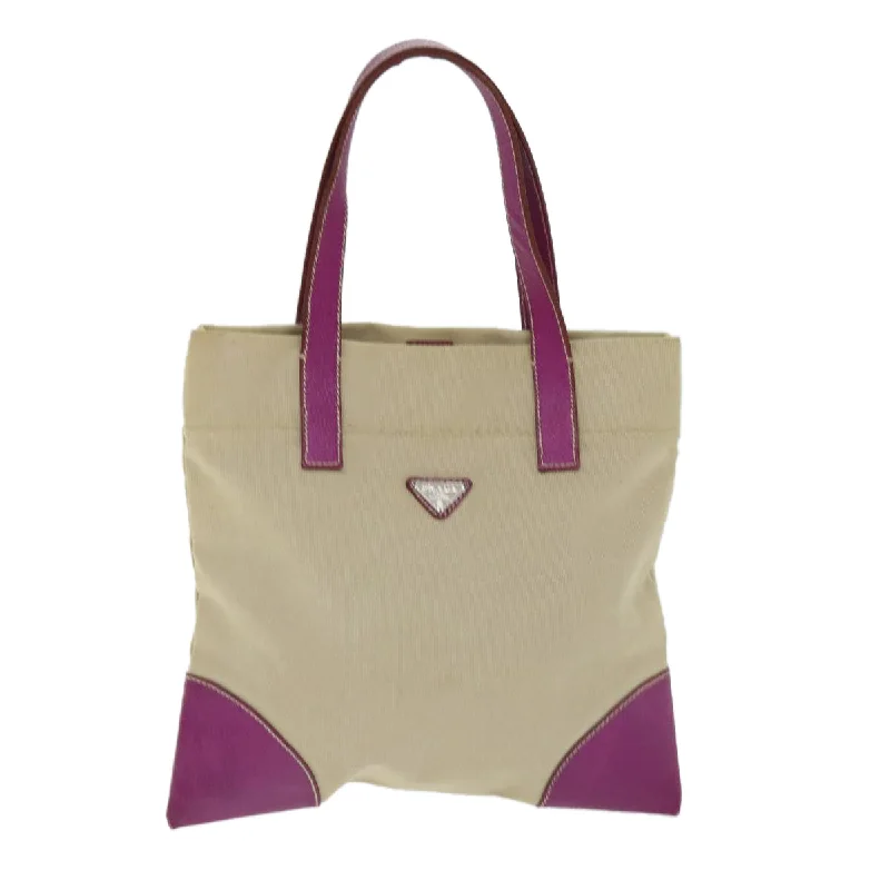 Quilted Tote Bag in Cream with Silver Hardware for a Classic and Sophisticated StyleWomen's Tote Bag with Zipper Closure in Red for Secure StoragePrada  Canvas Tote Bag (Pre-Owned)