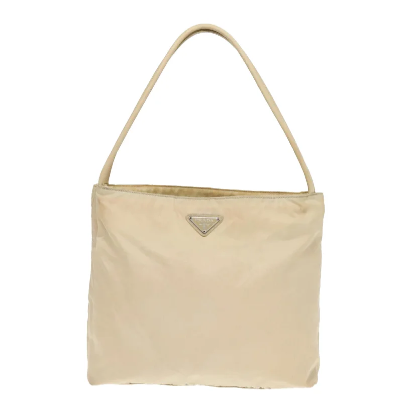 Oversized Jute Tote Bag in Natural Color with Rope Handles for a Beach VacationFaux Fur - Trimmed Tote Bag in White for a Cozy Winter LookPrada Re-Nylon  Synthetic Tote Bag (Pre-Owned)
