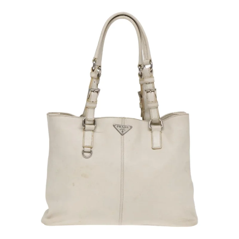 Embroidered Tote Bag in Beige with Floral Motifs for a Boho - Chic VibePatchwork Tote Bag in Denim with Vintage - Inspired Designs for a Retro AppealPrada Saffiano  Leather Tote Bag (Pre-Owned)