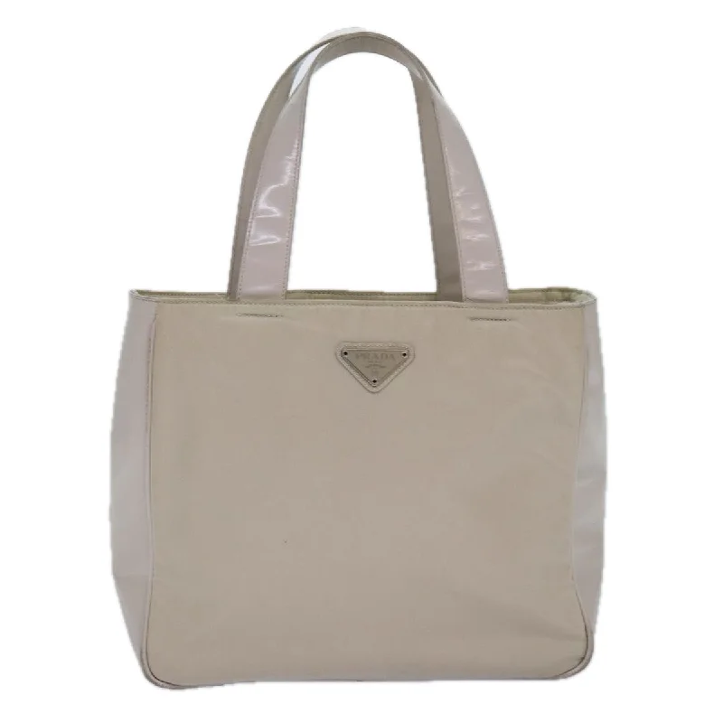 Quilted Tote Bag in Cream with Silver Hardware for a Classic and Sophisticated StyleMetallic Tote Bag in Rose Gold with Chain Handles for a Glamorous Night OutPrada Tessuto Synthetic Tote Bag (Pre-Owned) Quilted Tote Bag in Cream with Silver Hardware for a Classic and Sophisticated StyleMetallic Tote Bag in Rose Gold with Chain Handles for a Glamorous Night OutPrada Tessuto Synthetic Tote Bag (Pre-Owned)