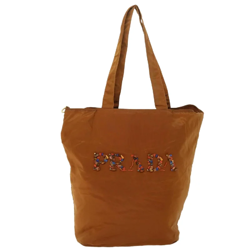 Metallic Tote Bag in Rose Gold with Chain Handles for a Glamorous Night OutMetallic Tote Bag in Rose Gold with Chain Handles for a Glamorous Night OutPrada Tessuto  Synthetic Tote Bag (Pre-Owned)