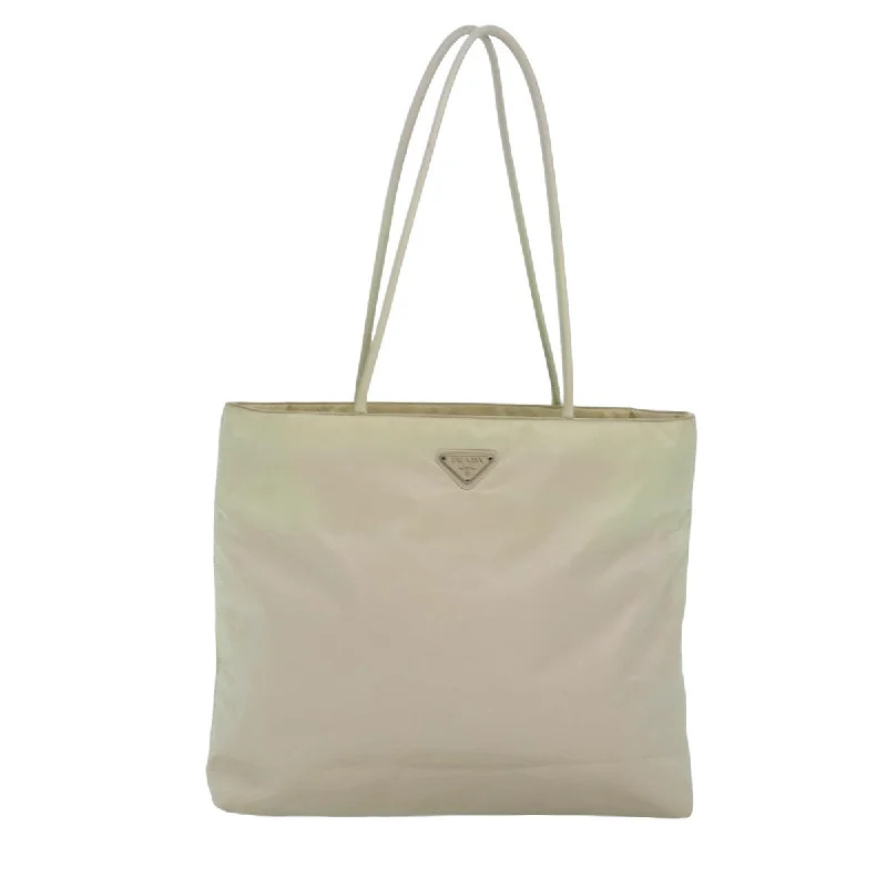 Monogrammed Tote Bag in Brown Leather with Personalized Initials for a Custom and Elegant TouchFaux Fur - Trimmed Tote Bag in White for a Cozy Winter LookPrada Tessuto  Synthetic Tote Bag (Pre-Owned)