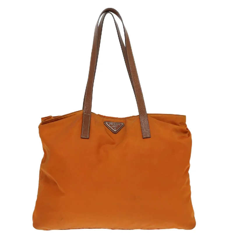 Linen Tote Bag in Natural Beige with Braided Details for a Rustic Summer EnsembleMetallic Tote Bag in Rose Gold with Chain Handles for a Glamorous Night OutPrada Tessuto  Synthetic Tote Bag (Pre-Owned)