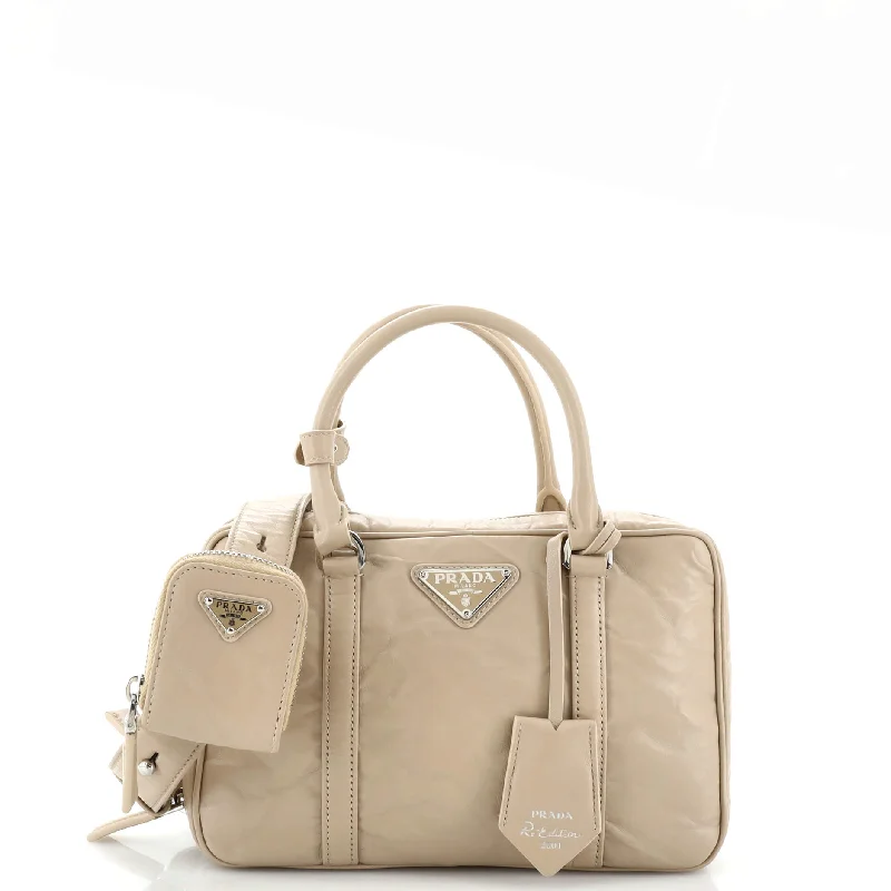 Women's Shoulder Bag with Fringe Details in Brown for a Bohemian StyleRe-Edition Top Handle Bauletto Bag Nappa Antique Medium