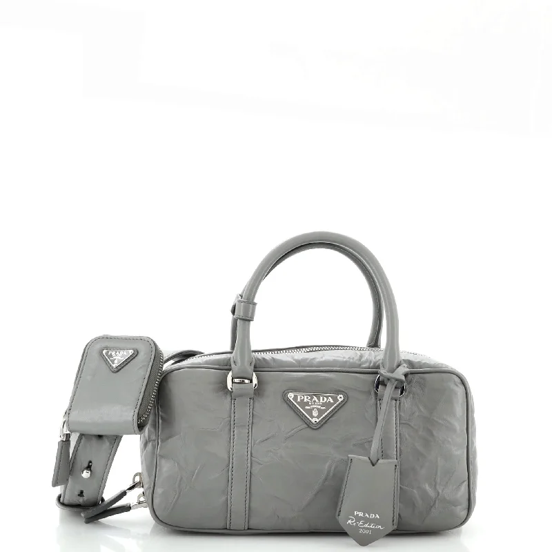 Pvc Shoulder Bag in Clear with Glitter for a Fun and Modern LookRe-Edition Top Handle Bauletto Bag Nappa Antique Medium