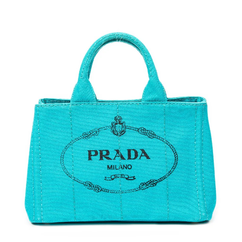 Faux Fur - Trimmed Tote Bag in White for a Cozy Winter LookPatchwork Tote Bag in Denim with Vintage - Inspired Designs for a Retro AppealSmall Canapa Tote