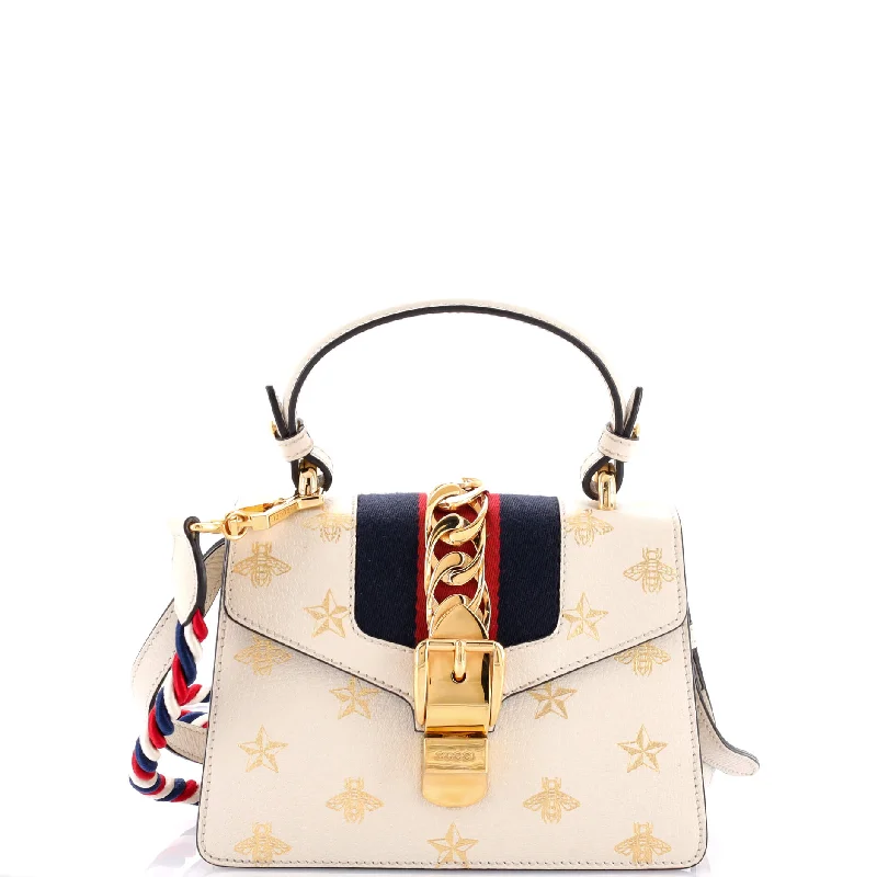 Women's Canvas Shoulder Bag in Navy with Striped Pattern for Beach TripsSylvie Top Handle Bag Printed Leather Mini