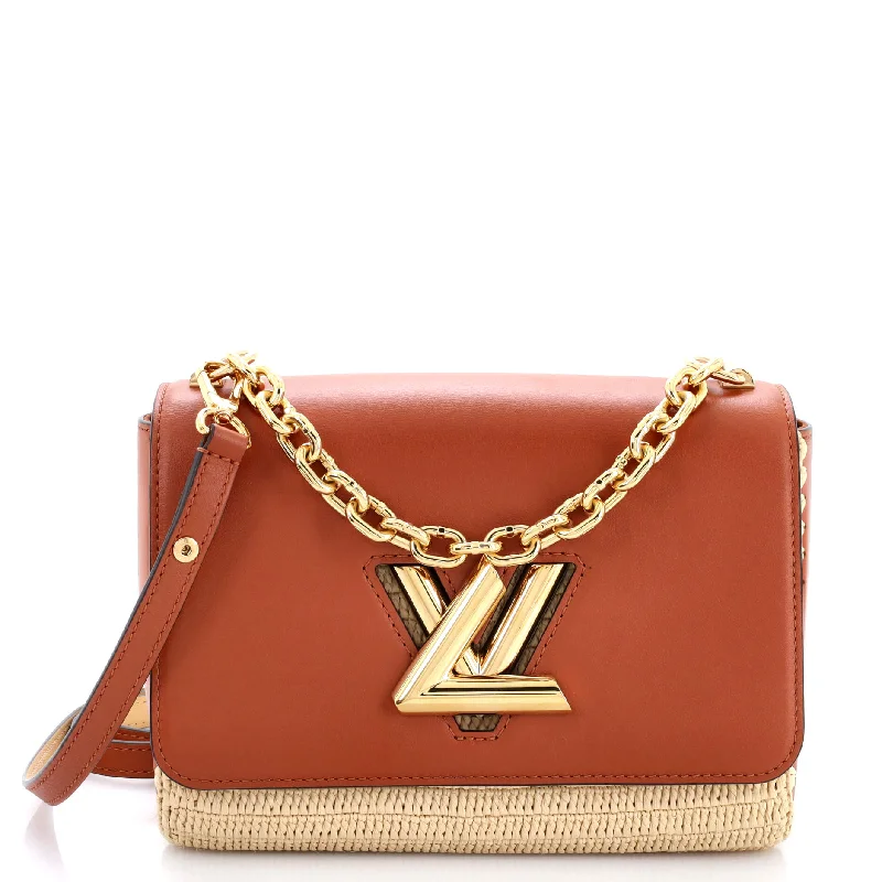 Embroidered Denim Shoulder Bag in Blue for a Vintage VibeTwist Convertible Handbag Leather and Raffia MM