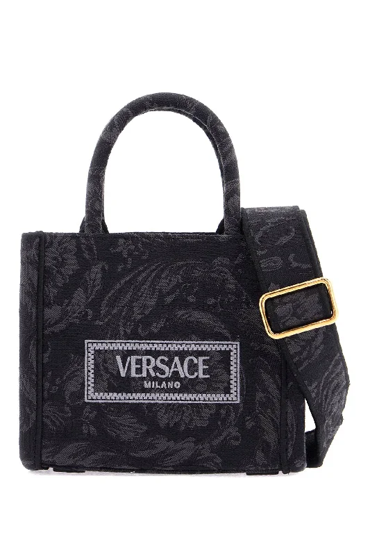 Monogrammed Tote Bag in Brown Leather with Personalized Initials for a Custom and Elegant TouchFaux Fur - Trimmed Tote Bag in White for a Cozy Winter LookVersace Women's Athena Barocco Mini Tote Bag