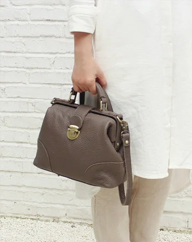 Women's Waterproof Nylon Shoulder Bag in Green for HikingWomen's Canvas Shoulder Bag in Navy with Striped Pattern for Beach TripsVintage LEATHER WOMEN Doctor Handbag Doctor Purse SHOULDER BAG Purse FOR WOMEN