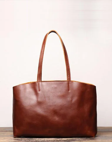 Women's Printed Tote Bag in Floral Patterns for a Spring - Themed Shopping TripMetallic Tote Bag in Rose Gold with Chain Handles for a Glamorous Night OutVintage Mens Womens Leather Large Brown Tote Handbag Shoulder Tote Purse Tote Messenger Bag For Men