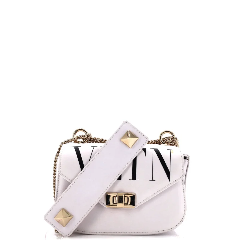 Canvas and Leather Combo Shoulder Bag in Tan for a Rustic LookVLTN Flap Saddle Bag Printed Leather Mini