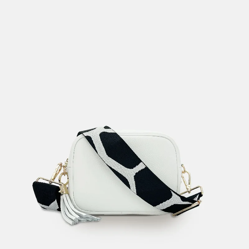 Women's Crossbody Bag with Magnetic Closure in White for Quick AccessWhite Leather Crossbody Bag With Black & White Giraffe Strap